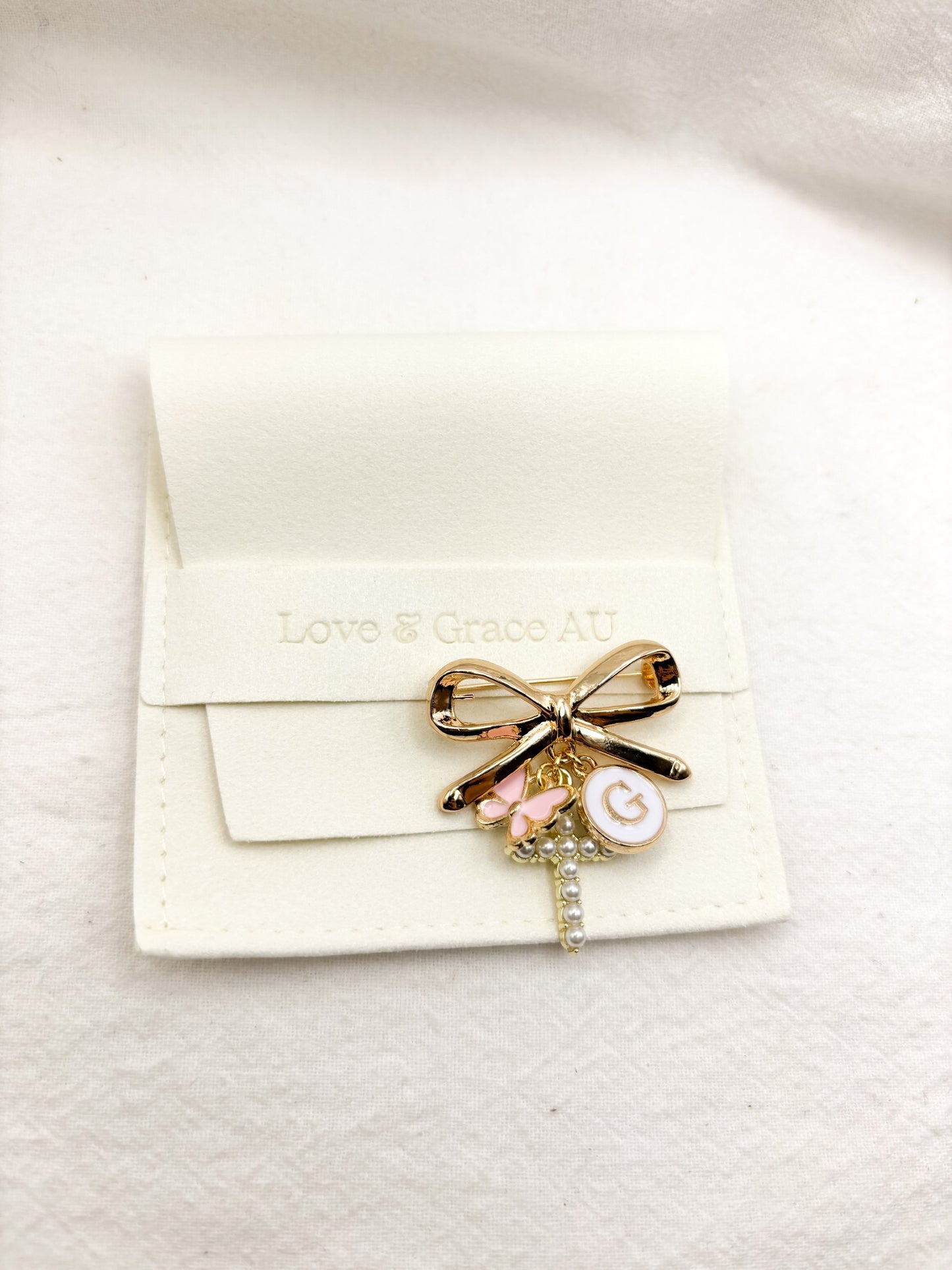 Gold bow brooch personalised baby keepsake pin